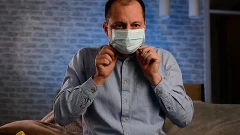 Man put on protective mask Stock Footage 149137774