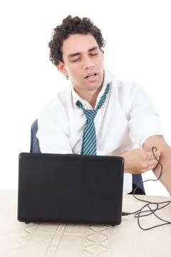 Man put the usb cable from laptop computer into his  arm vein Stock Photos