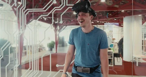 Man puts on and takes off virtual reality glasses Stock Footage 92290106