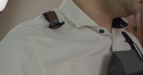 Man puts on a bar apron Stock Footage 130051214