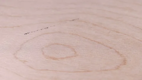 Man puts bar code print on wooden box, made in Europe Stock Footage 104539401