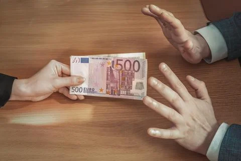 Man puts both hands forward and refuses to take euro as a bribe. Corruption.. Stock Photos