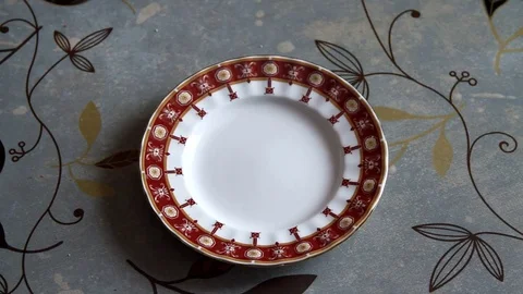 Man puts the bread on a plate Stock Footage 71289450