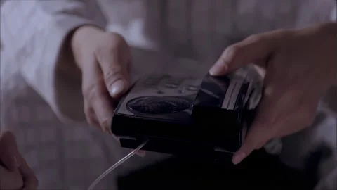 The man puts down the phone in his hand Stock Footage 265537506