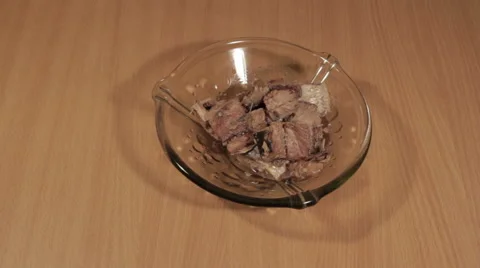 Man puts fish on the table Stock Footage 68494879