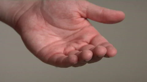 A man puts a gemstone ring on a woman's hand. Stock Footage 557618