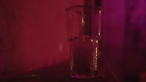 Man puts a glass with drink Stock-Footage 197327112