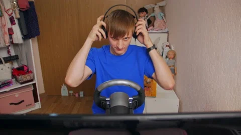 Man Puts On Headphones At The Computer Stock Footage 168350994