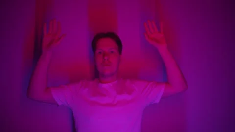 The man puts his hands up when he sees the police Stockbeeldmateriaal 274401775