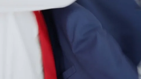 Man puts on a jacket close-up Stock Footage 73290432