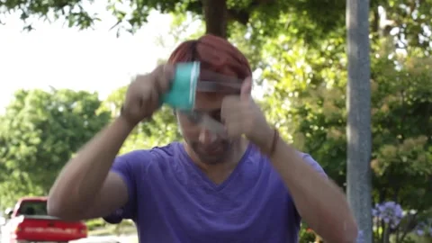 Man Puts On Mask, Walk Out of Frame Stock Footage 134739158