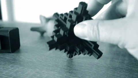 A man puts a model printed on a 3D printer close-up. Stock Footage 213343481