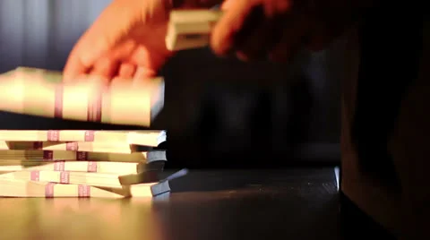 Man puts a packets of money on the table Vídeo Stock 26039951