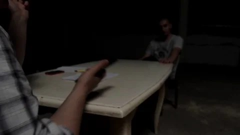 Man puts pistol on the table Stock Footage 71575631