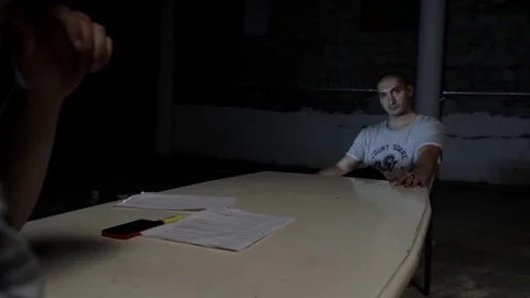 Man puts pistol on the table Stock Footage 71575680