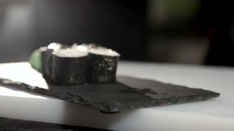 Man puts red ginger on table. Bare hands. Close-up. Ginger is red.White table 스톡 동영상 87012236