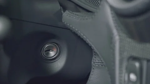 Man puts red key in ignition Stock Footage 96521041
