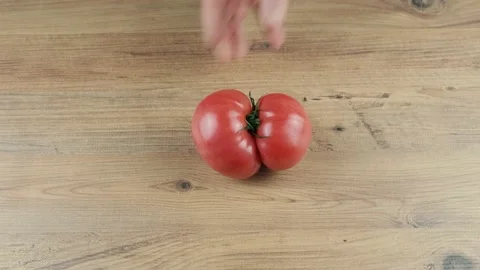 Man puts on the table ugly vegetables Stock Footage 168837325