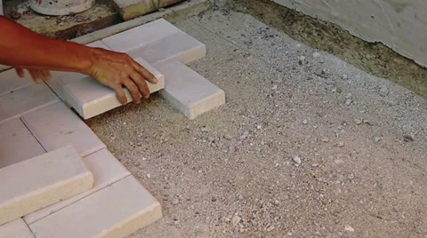 Man Puts a Tile Stock Footage 24811723