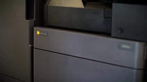 Man puts toner in the printer YCMK Stock Footage 74000239