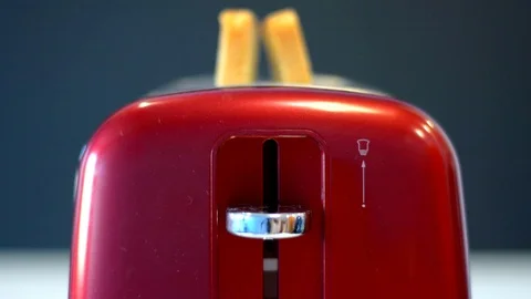 Man puts two toasts in a toaster Stock Footage 109257550