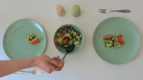 Man puts a vegetarian salad Stock Footage 89167433