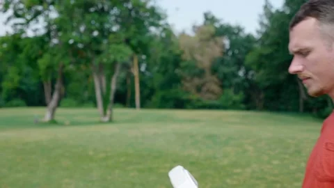 Man puts a virtual reality helmet on his head and controls gestures Stock Footage 130489080