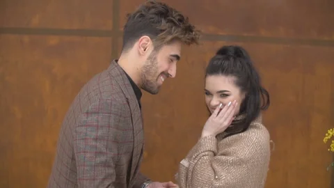 Man puts on a wedding ring Stock Footage 129070080