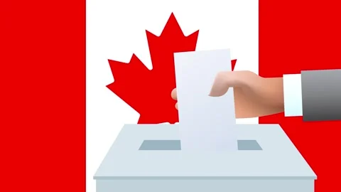 Man putting ballot in a box during elections in Canada in front of flag. Stock Footage 283533364