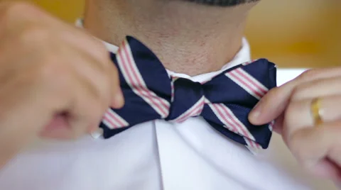 Man Putting On Bowtie Stock Footage 53488363