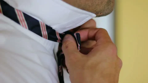 Man Putting On Bowtie 動画素材 53488524