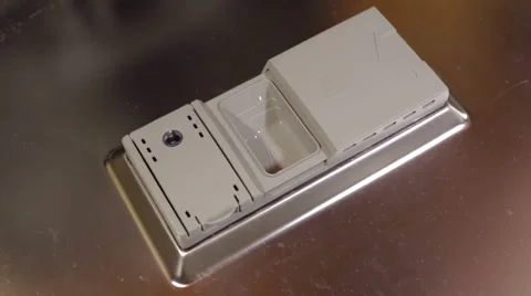 Man putting detergent tablet into the dishwasher Stock Footage 41471848