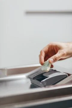 Man putting detergent tablet into open dishwasher indoors, closeup Stock Photos