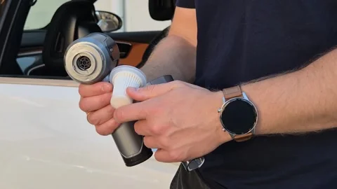 Man putting filter into cordless car vacuum cleaner, close-up Video stock 316476868