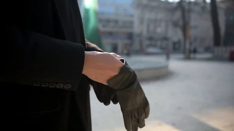 Man putting gloves Stock Footage 83923353
