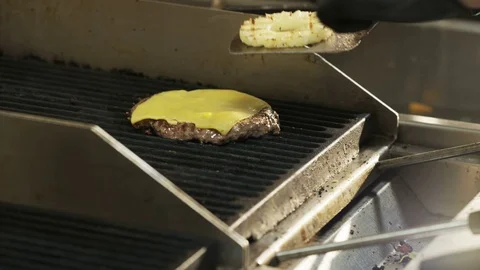 Man Putting Grilled Pineapple on Cheese Stock Footage 71568314