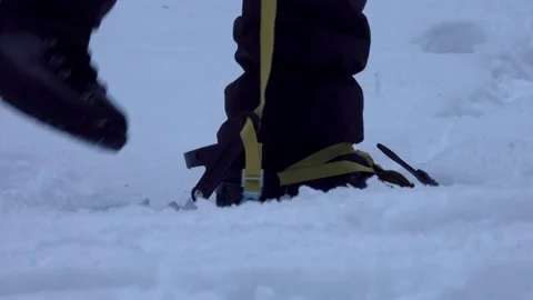 Man Putting On Ice Crampons Stock Footage 170303569