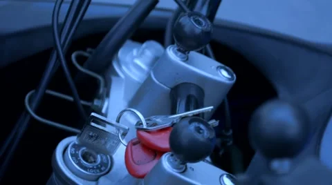 Man Putting Keys into Motorcycle Stock Footage 46640372