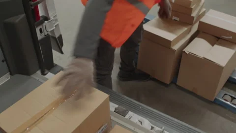 Man Putting Packages into Cargo Van Working at Storage Office Stock Footage 256065865