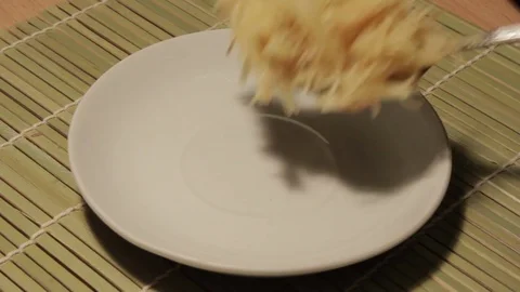 Man putting pasta on to plate. Stock Footage 69722236