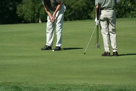Man putting Stock Photos