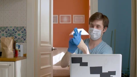 Man putting on protective gloves Stock Footage 127079615