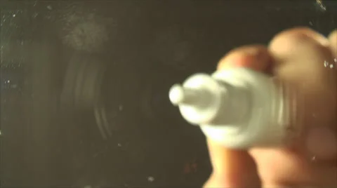 Man Putting Saline Solution On A Glass Table, Below Shot, Solution Stock Footage 41198370