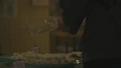 Man putting sushi into a to go box Stock Footage 103878697