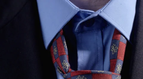 Man putting on tie Stock Footage 35278370