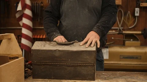 Man putting tool box away in workshop Stock Footage 102045243