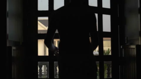 Man in pyjama bottom going on his terrace and admires the view  Stock Footage 102039614