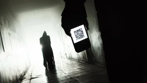 A man with a QR code approaches the executioner Stock Footage 167681164