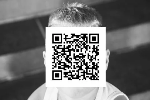 Man with qr code on his face Stockfoto's