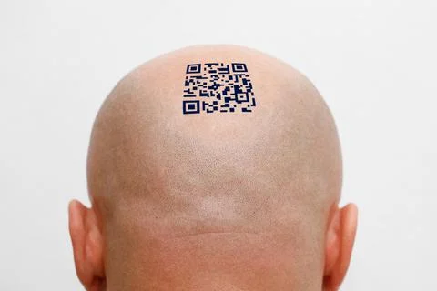 A man with a qr code on his head. The concept of global control and management Foto stock